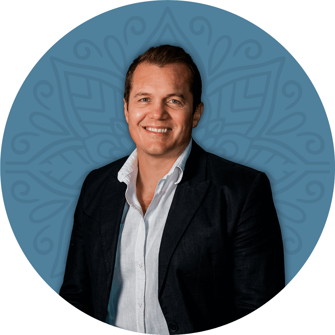 Dr Kobus van der Walt, specialist psychiatrist, seated in consultation